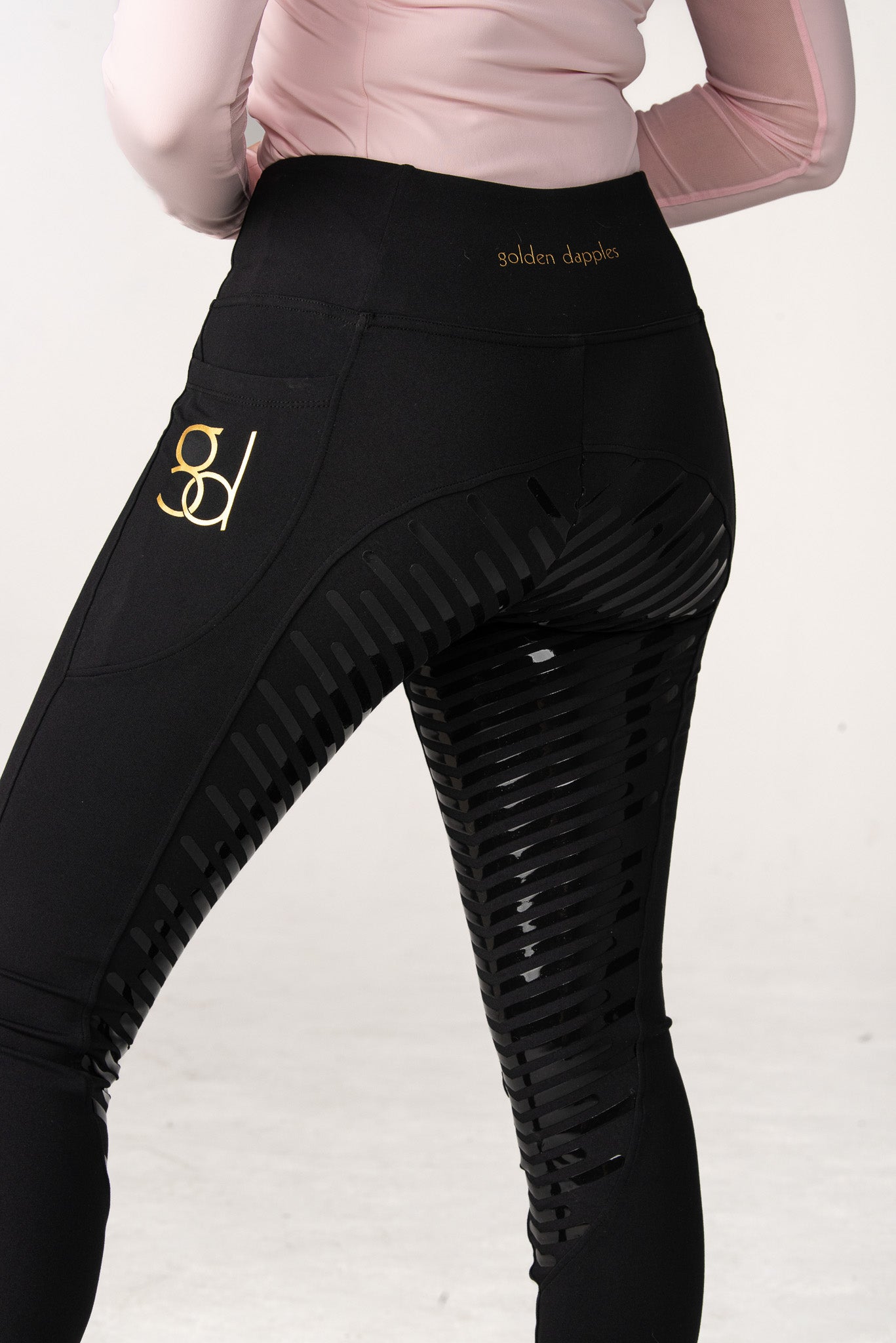 golden dapples pro grip riding leggings in black with gold logo and golden dapples pink sun shirt