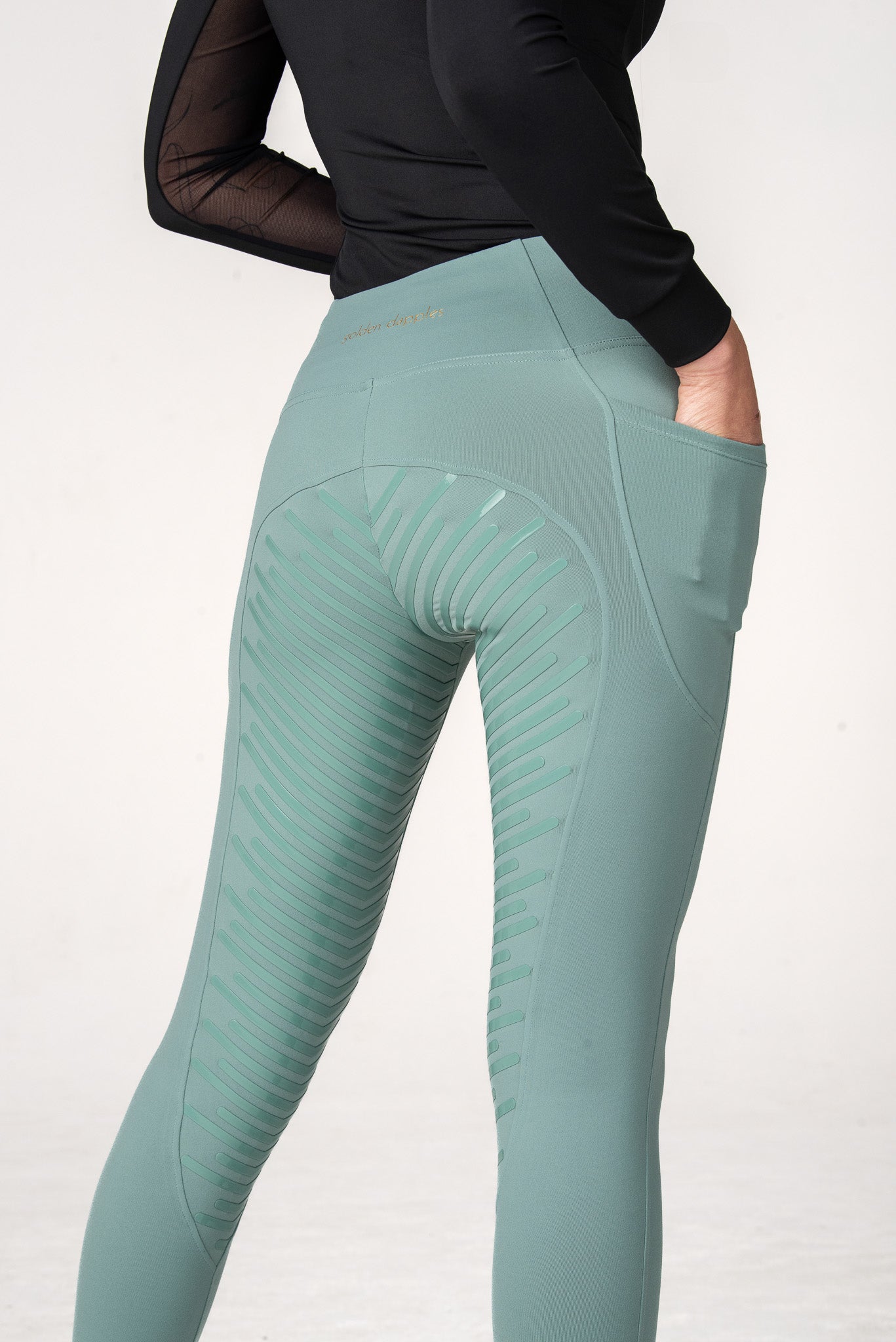 golden dapples sage green pro grip riding leggings with black sun shirt