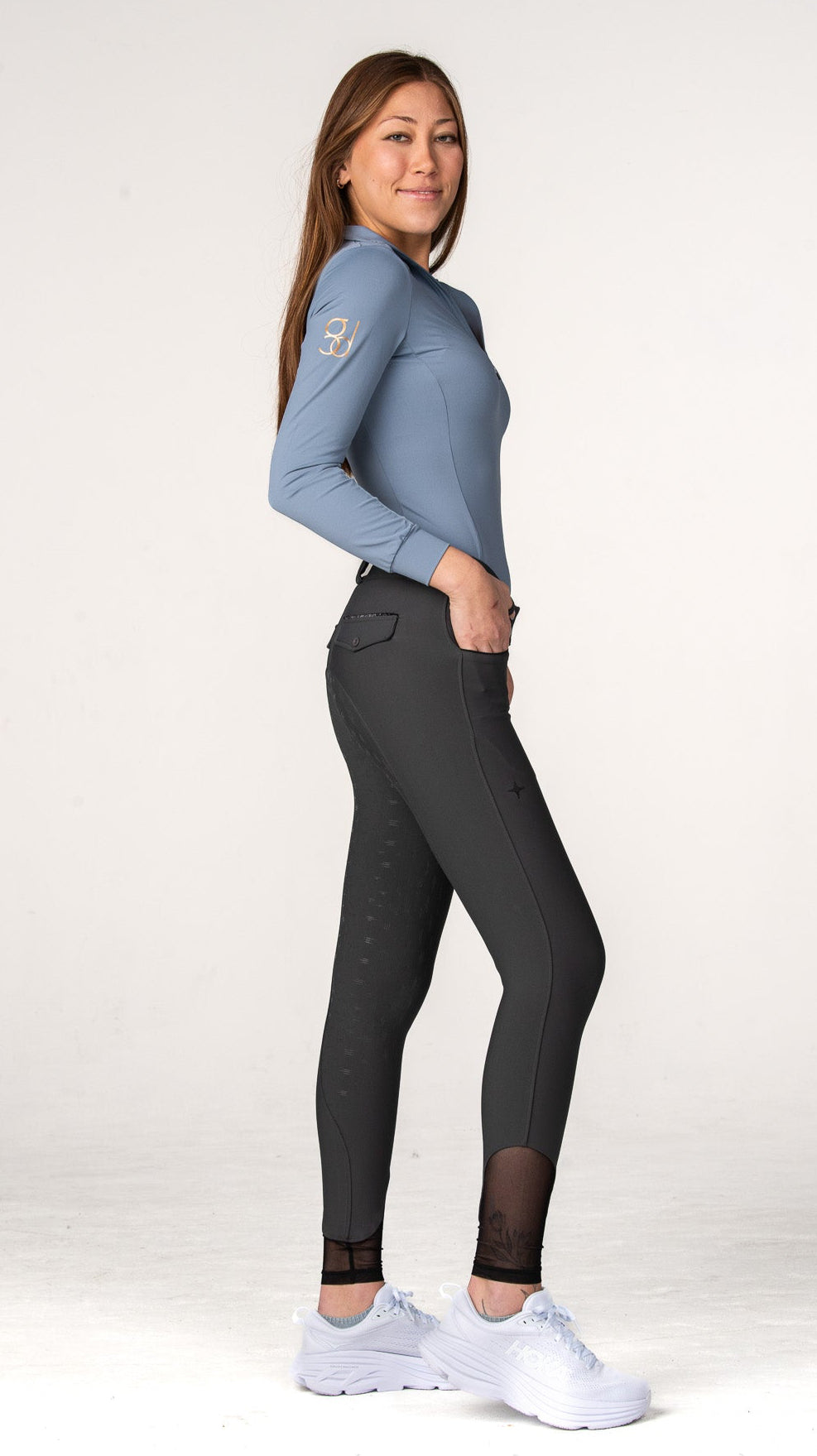 full body of grey pro breeches and blue sun shirt golden dapples